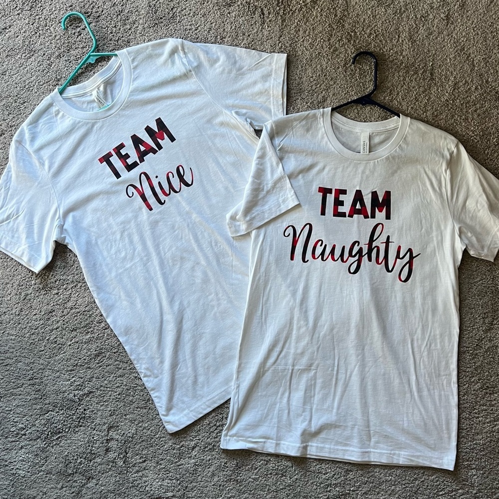 Christmas themed Naughty& Nice tshirts. 1 NWOT, 1 worn once.  Large and Medium.
